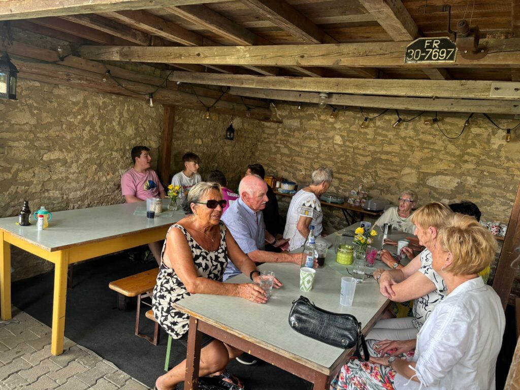 a group of people sitting at a table