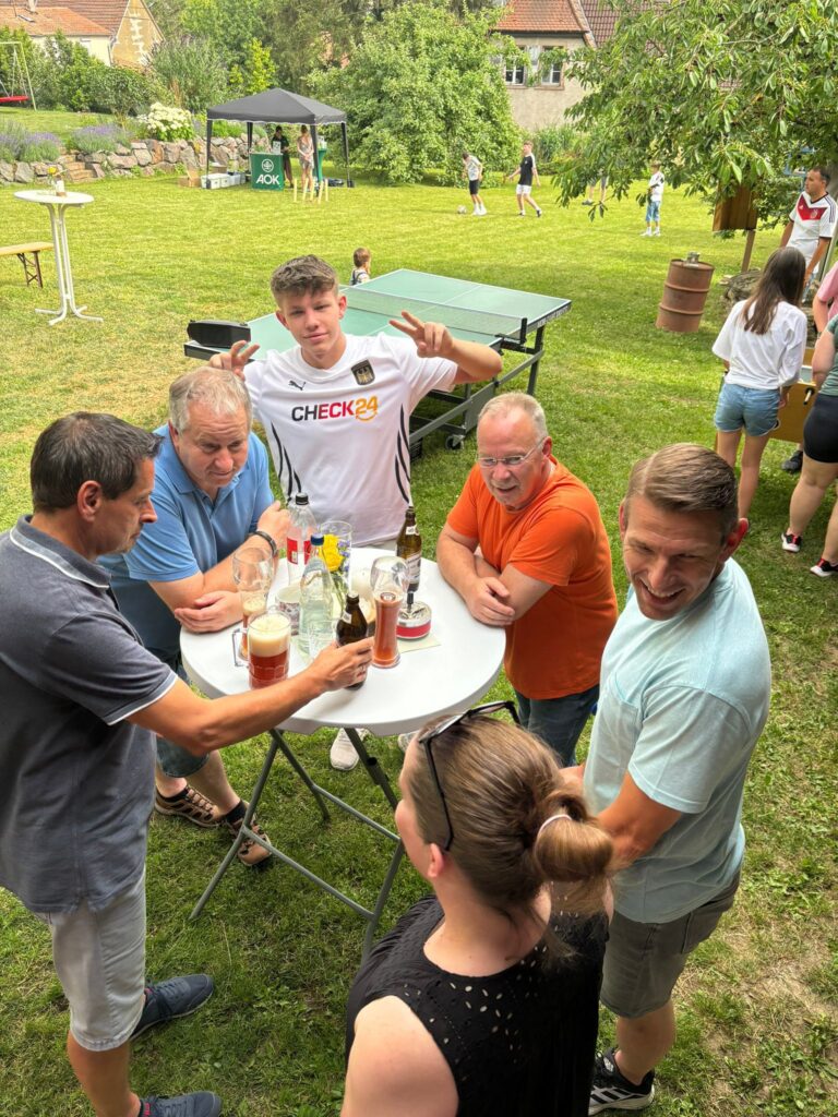 a group of people around a table