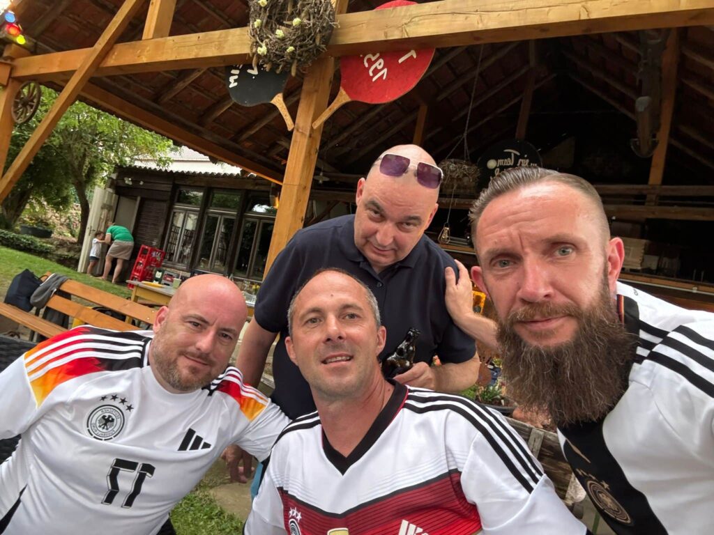 a group of men posing for a picture