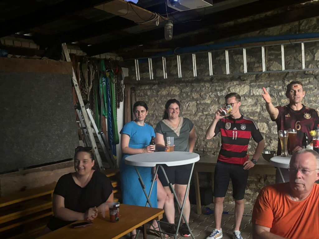 a group of people sitting around a table