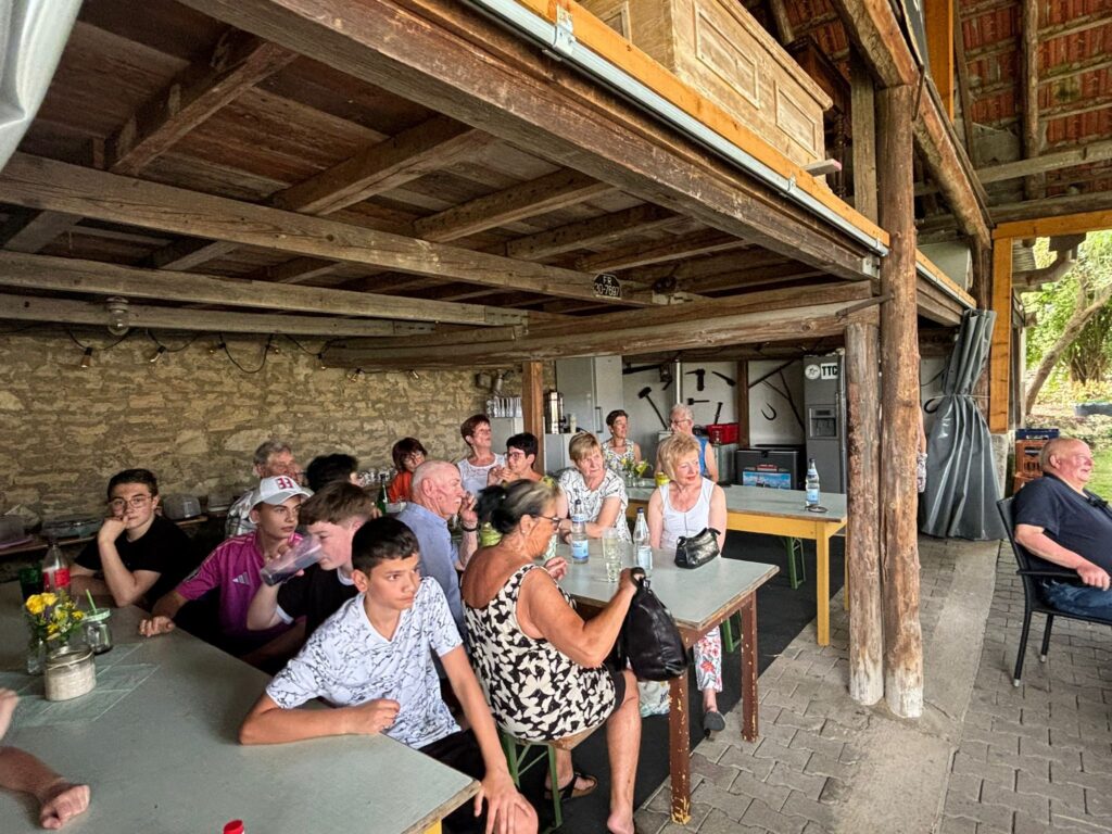a group of people sitting at tables