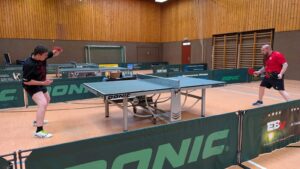 a ping pong table in a gym