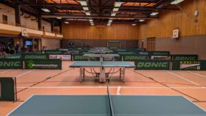 a ping pong table in a gym